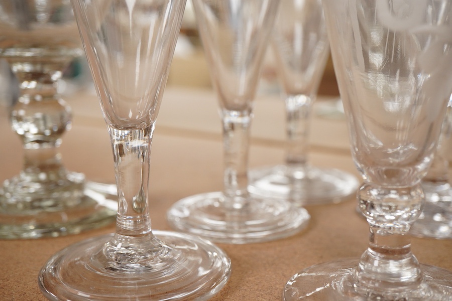 A a set of three early 19th century ale glasses with folded feet, together with two additional engraved ale glasses, a knopped rummer and another, tallest 18cm